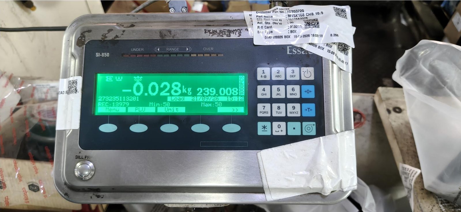 Front of an Essae SI-850 weighing indicator showing a weight on its green display, a keypad and a row of soft keys
