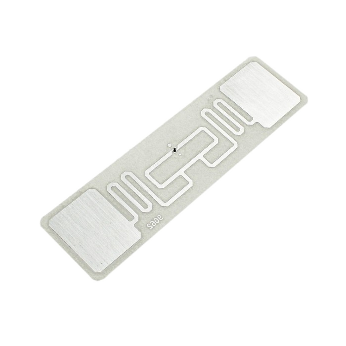A UHF RFID dipole inlay tag showing its chip and antenna traces