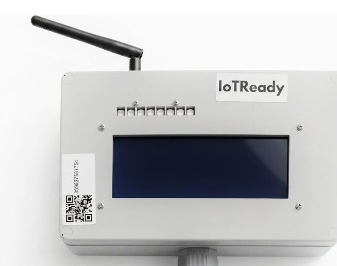 IoTReady BLE Gateway wall unit with an external antenna and onboard LCD